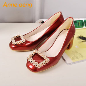 red heeled shoes
